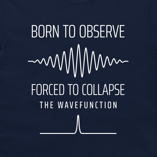 Close-up of the quantum wave packet and collapsed state graphic on a navy T-shirt