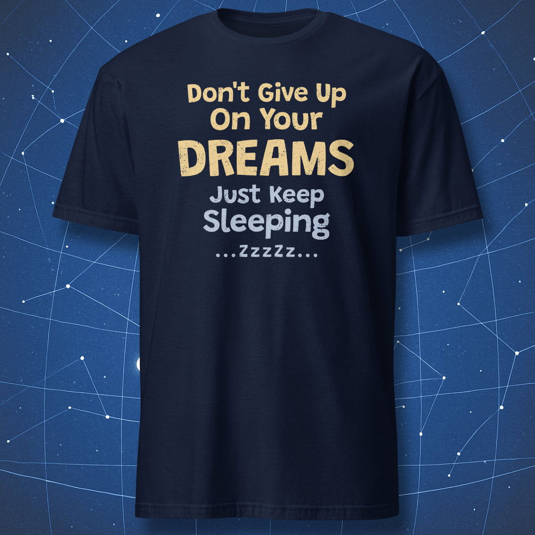 Navy T-shirt with distressed “Don't Give Up On Your Dreams – Just Keep Sleeping” typography.