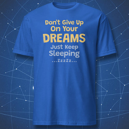 Royal blue T-shirt featuring the funny “Don't Give Up On Your Dreams – Just Keep Sleeping” quote.