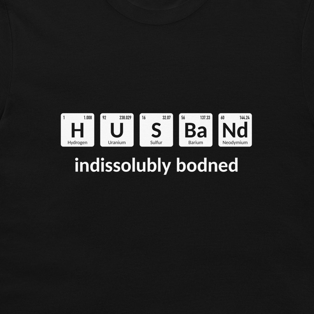 Close-up of black Husband periodic table T-shirt with indissolubly bonded text