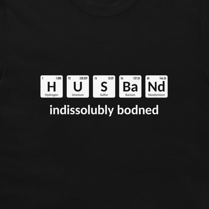 Close-up of black Husband periodic table T-shirt with indissolubly bonded text