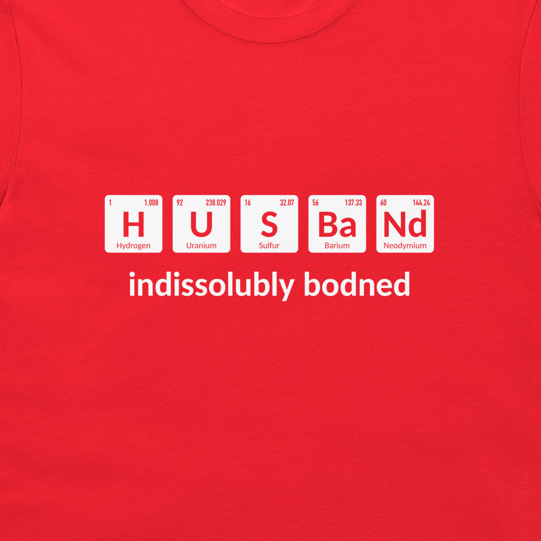 Close-up of red chemistry Husband T-shirt featuring periodic table element symbols