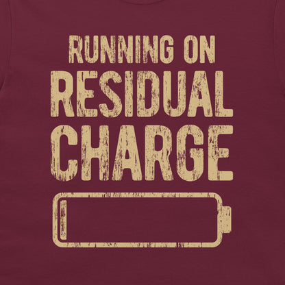 Close-up of the residual charge battery design printed on a maroon T-shirt