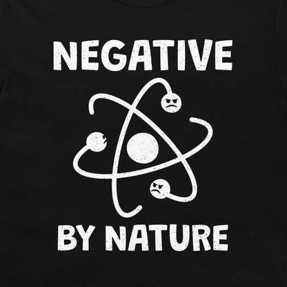 Close-up of the Negative by Nature atom and electron design on a black T-shirt