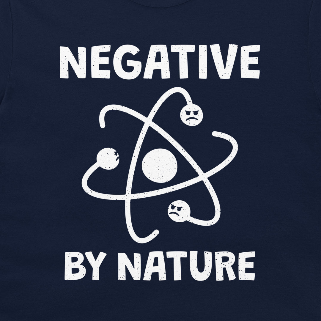 Close-up of the grumpy atom physics design on a navy T-shirt