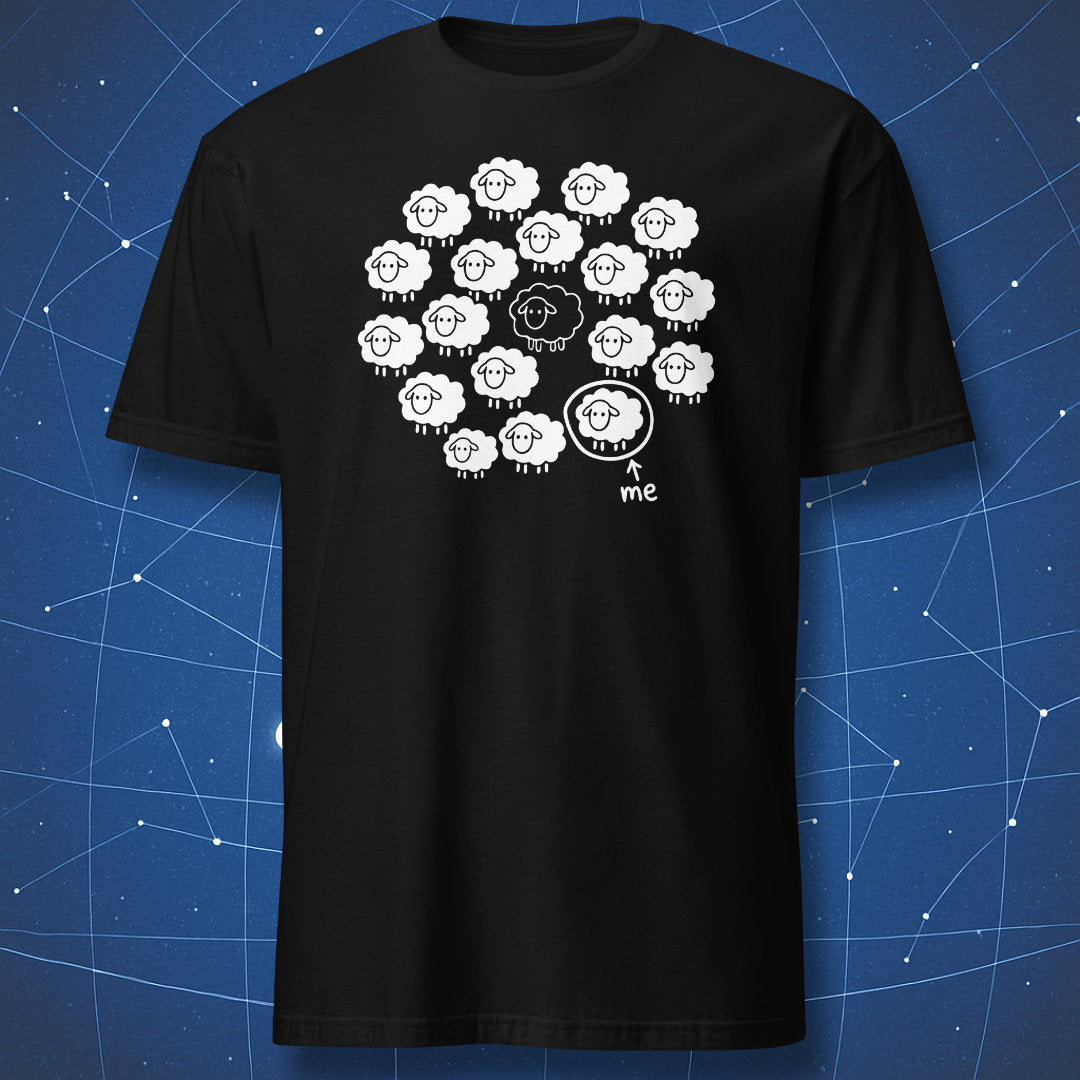 Not the Black Sheep T-shirt in black with a funny flock of sheep and one white sheep labeled me
