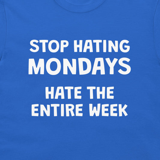 Close-up of Stop Hating Mondays Hate the Entire Week design on royal blue shirt
